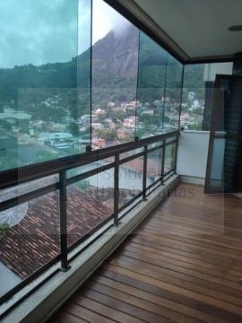 apartamento de dois quartos, sendo um suite e móveis planejados